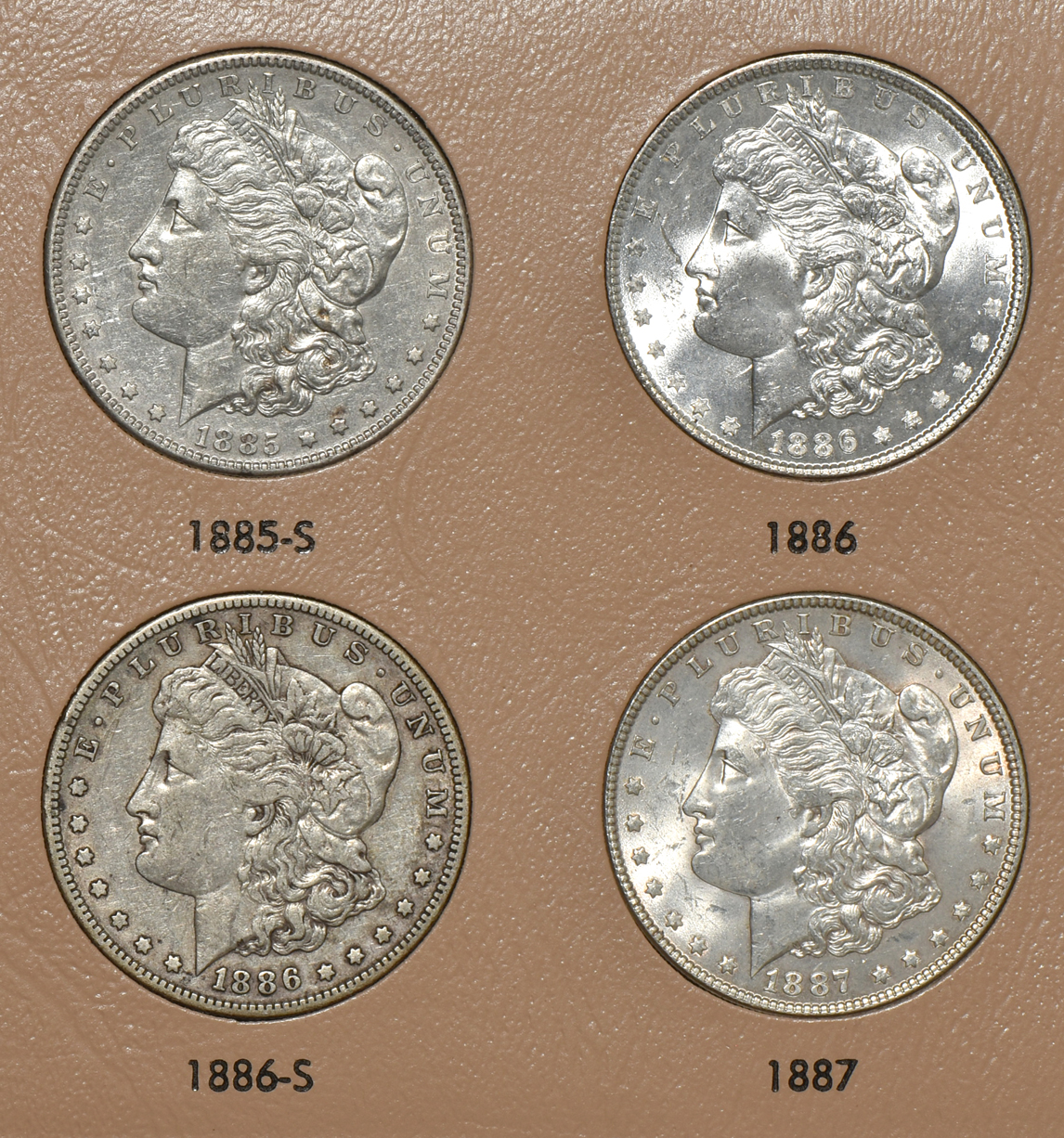 Collection of 40 different Morgan silver dollars in a Dansco 7178 album