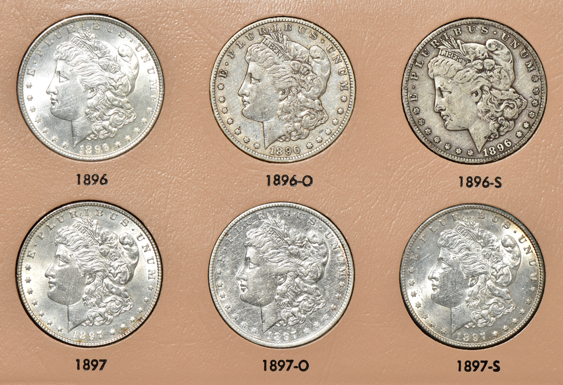 Collection of 39 different Morgan silver dollars in a Dansco 7179 album