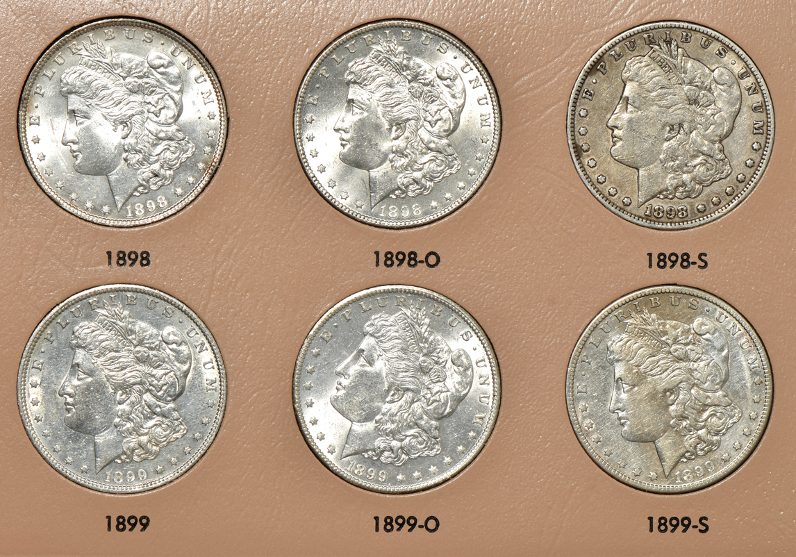 Collection of 39 different Morgan silver dollars in a Dansco 7179 album