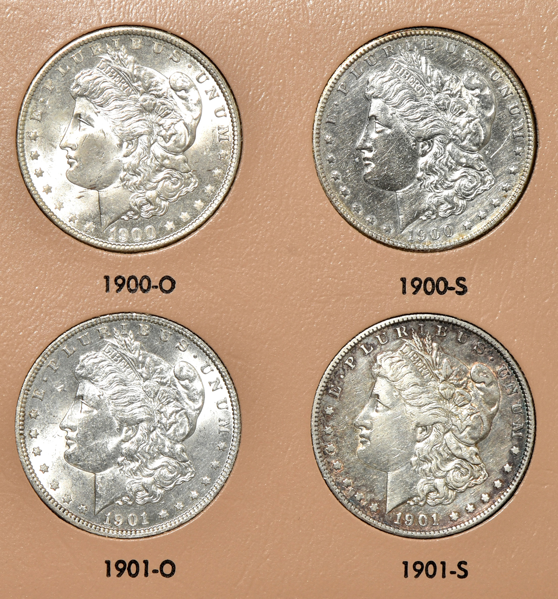 Collection of 39 different Morgan silver dollars in a Dansco 7179 album