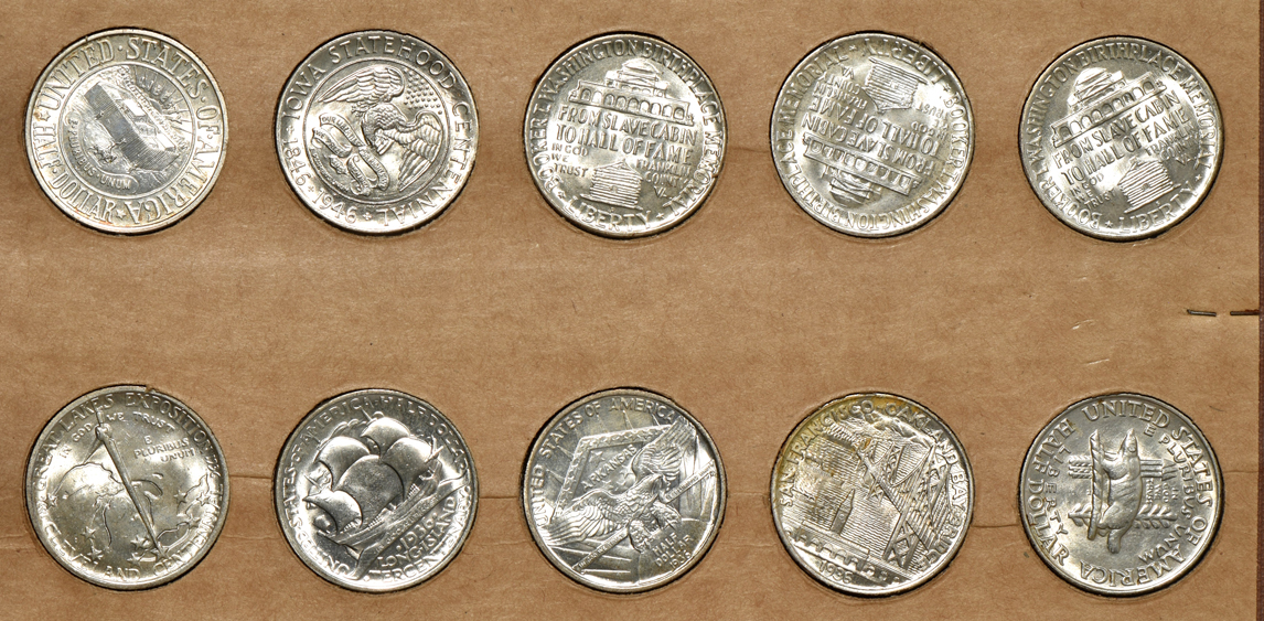 Collection of 20 silver commemorative half dollars in two Wayte Raymond pages
