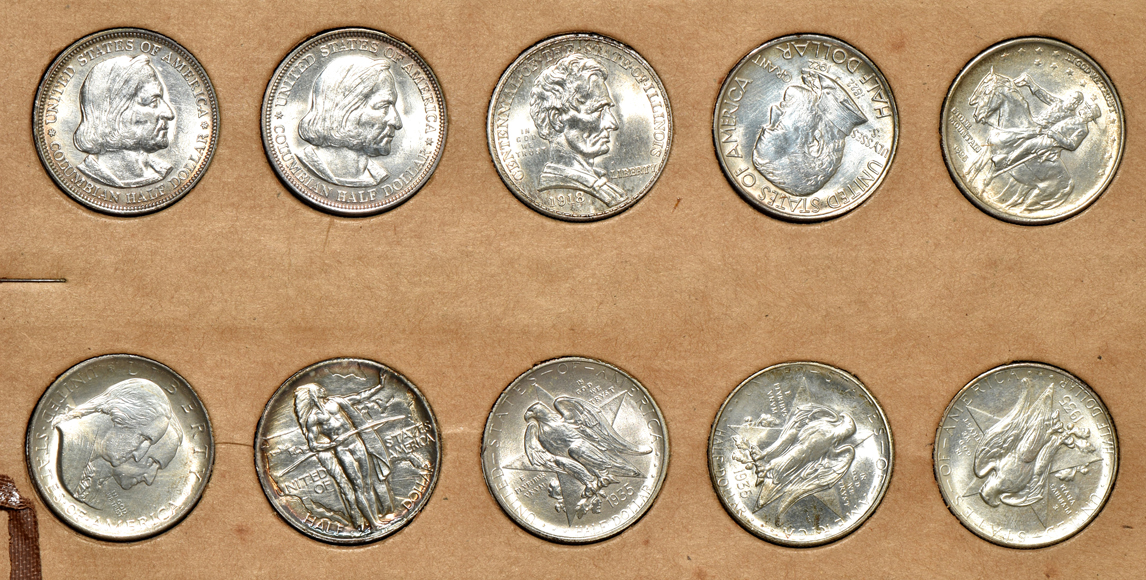 Collection of 20 silver commemorative half dollars in two Wayte Raymond pages