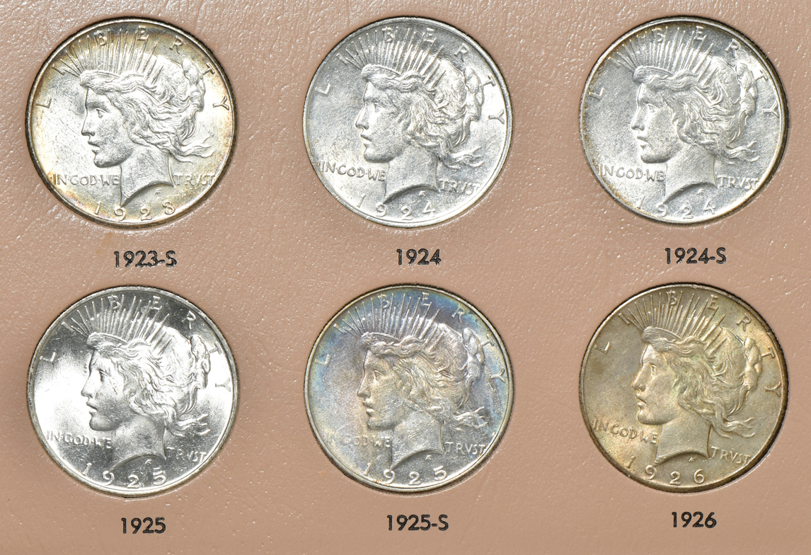 Complete collection of Peace silver dollars in a Dansco 7175 album