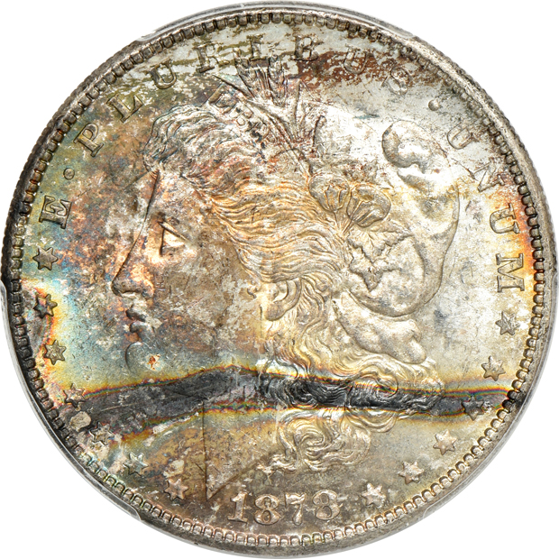 Five toned and certified Uncirculated Morgan silver dollars