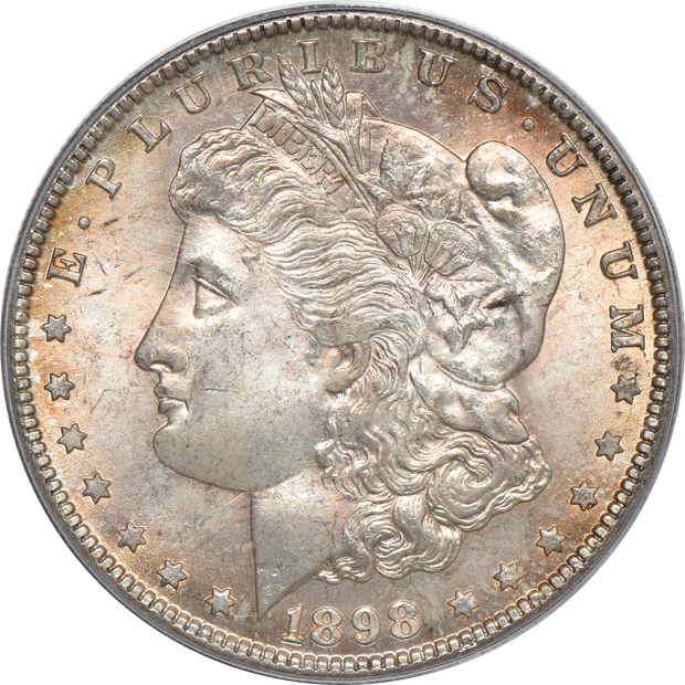 Four Uncirculated Morgan silver dollars certified by PCGS