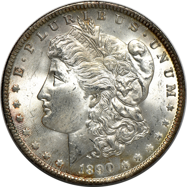 Four Morgan silver dollars, as described