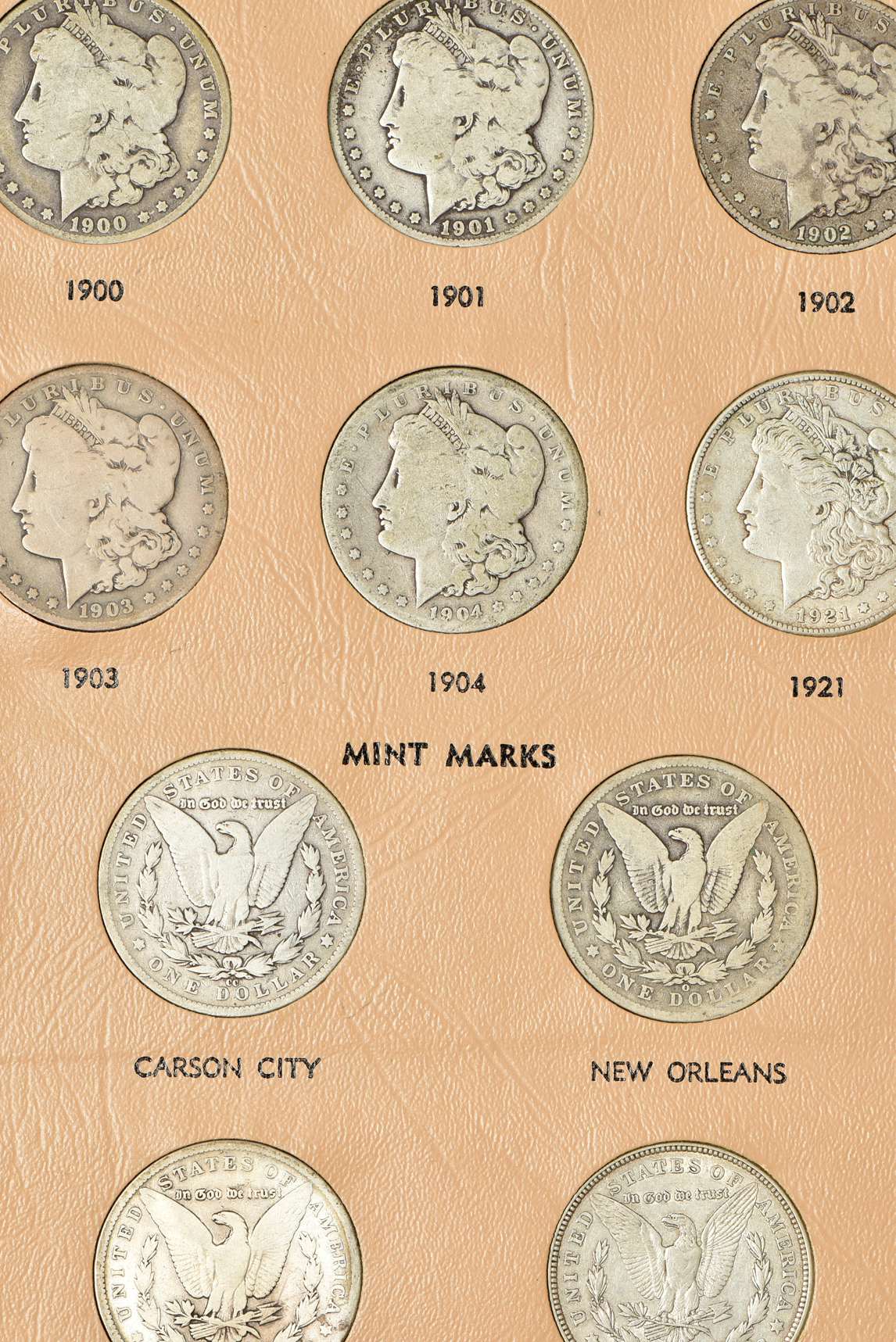 Complete Morgan dollar date set in a Dansco album