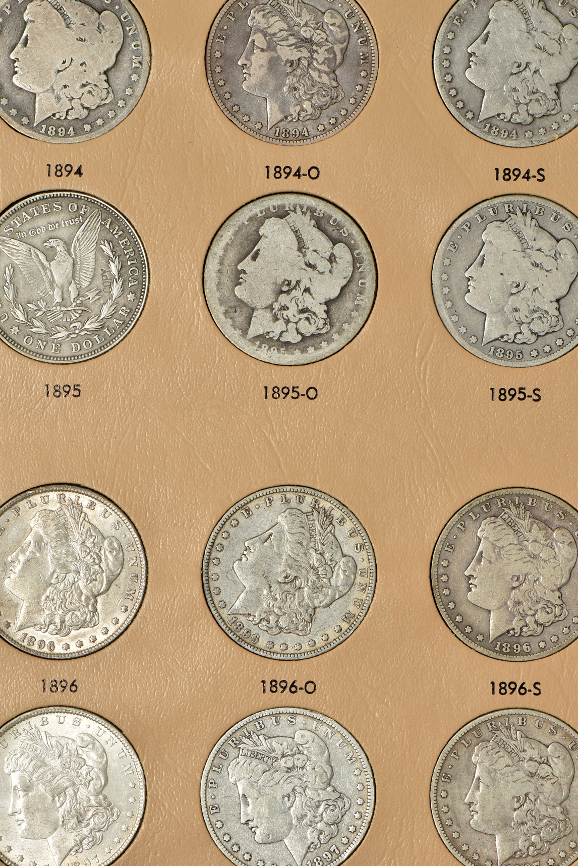 Collection of 47 Morgan silver dollars, 1891 through 1921-S, in a Dansco 7179 album