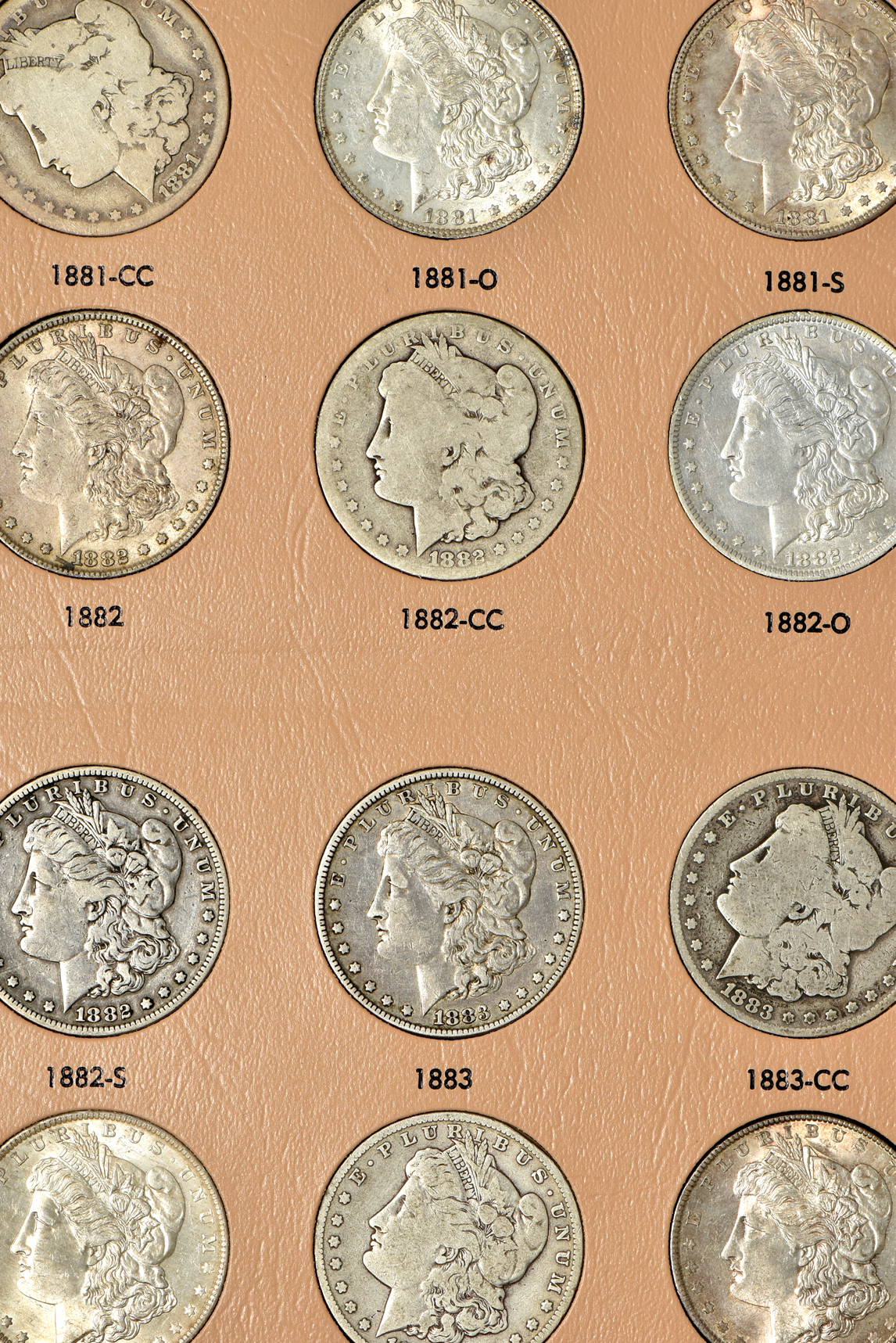 Collection of 48 Morgan silver dollars, 1878 through 1890-S, in a Dansco 7178 album