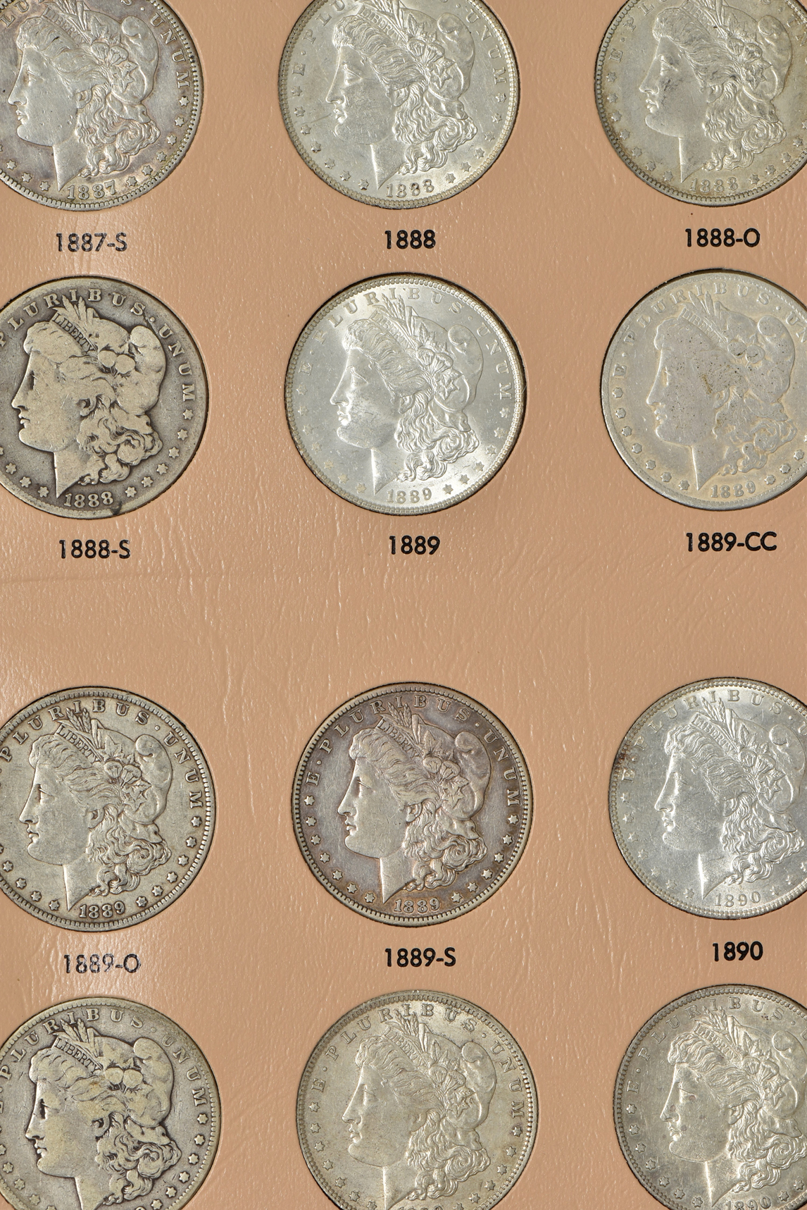 Collection of 48 Morgan silver dollars, 1878 through 1890-S, in a Dansco 7178 album