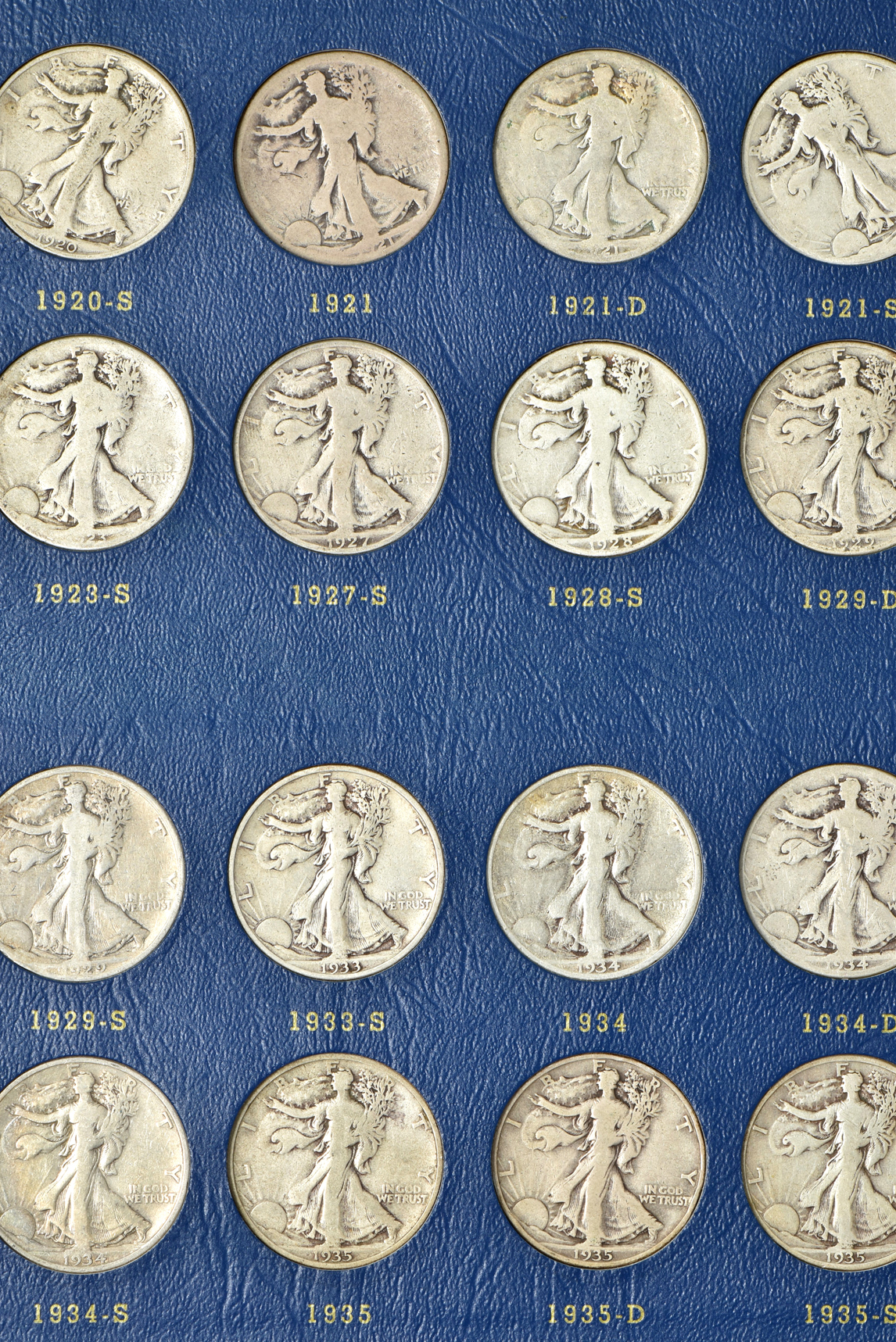 Complete collection of Walking Liberty half-dollars, 1916 through 1947-D, in two Whitman albums
