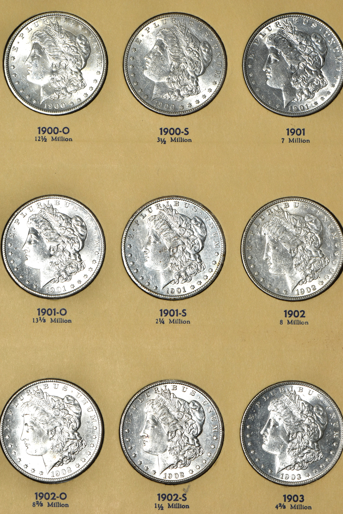Collection of 26 different Morgan silver dollars, 1897-O through 1921-S, in a Library of Coins Vol. 25 album