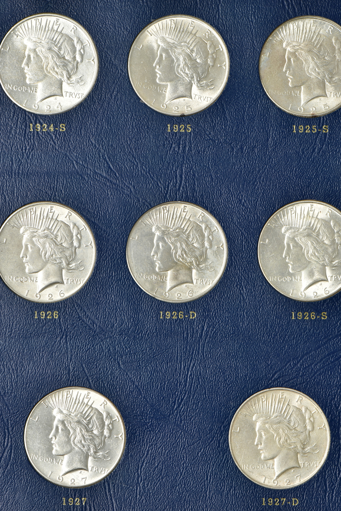 Complete collection of Peace silver dollars in a Whitman 9430 album