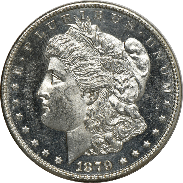 Four Morgan silver dollars, a Peace silver dollar, and a Walking Liberty half-dollar