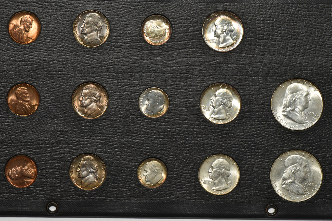Three 1948 year sets, one 1949 year set, and three 1953 year sets, all in pages