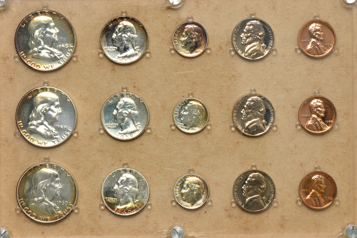 Three silver commemorative half-dollars, 1952 through 1960 Proof Sets, Roosevelt dimes, and Jefferson nickels, all in retro plastic cases
