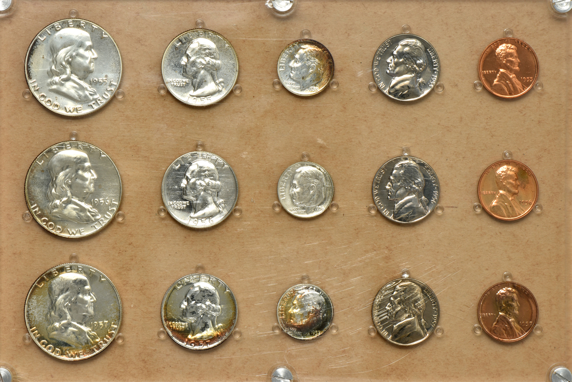 Three silver commemorative half-dollars, 1952 through 1960 Proof Sets, Roosevelt dimes, and Jefferson nickels, all in retro plastic cases