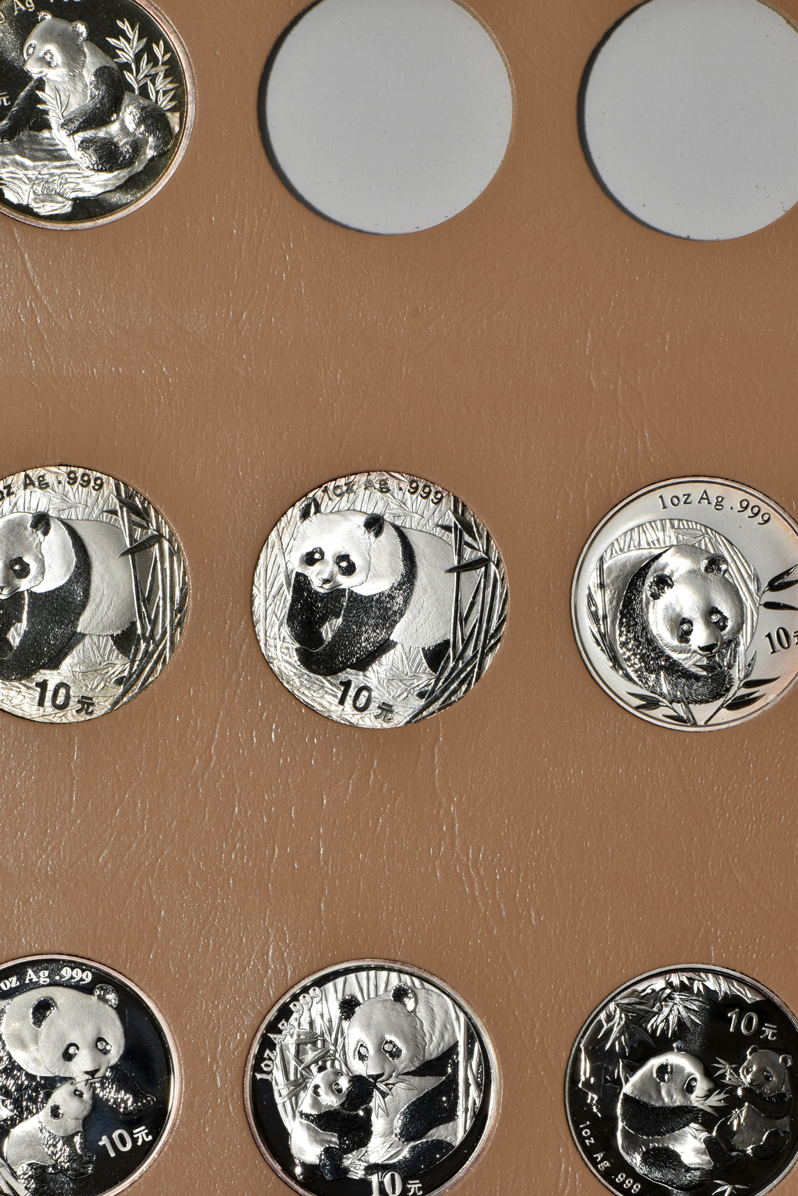 China - Twenty-four 1oz silver Pandas