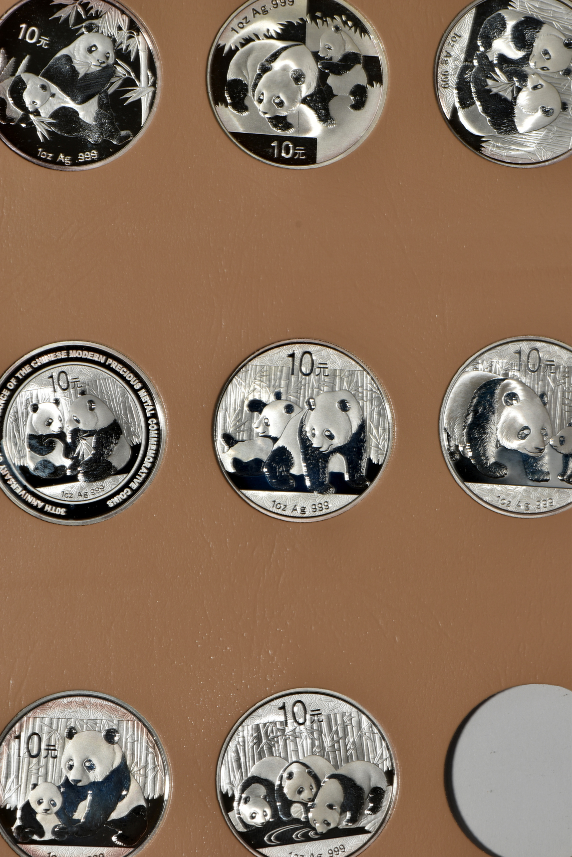 China - Twenty-four 1oz silver Pandas