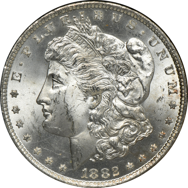 Five GSA Morgan silver dollars