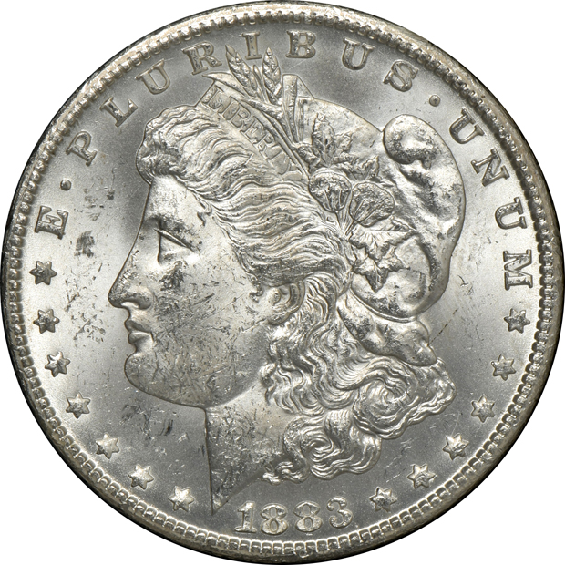 Five GSA Morgan silver dollars