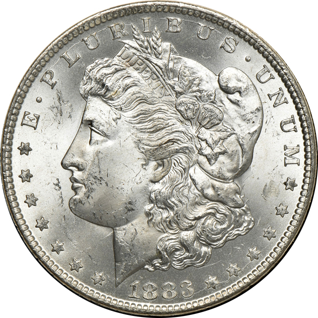 Four GSA Morgan silver dollars