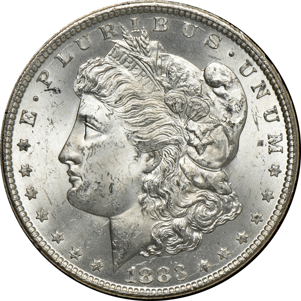 Four GSA Morgan silver dollars