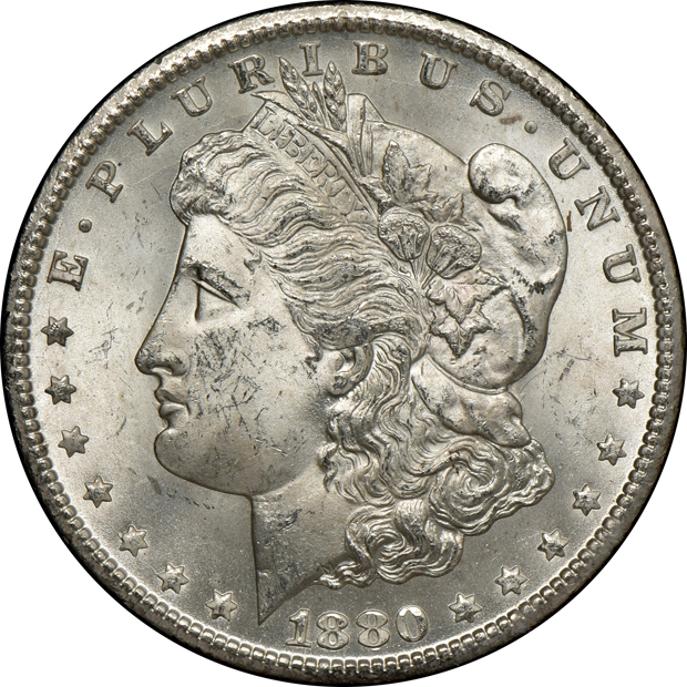 Four GSA Morgan silver dollars