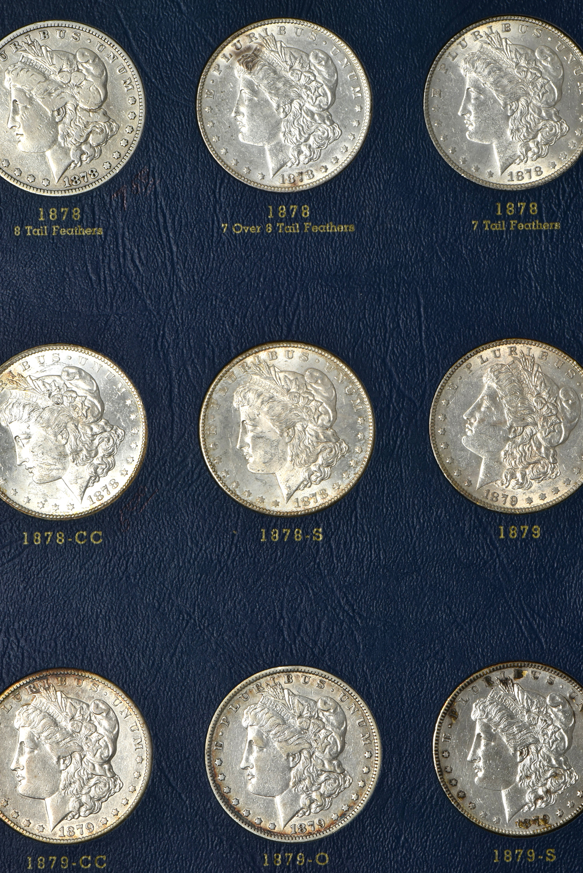Collection of Morgan silver dollars, 1878 through 1886-S in a complete Whitman 9427 album