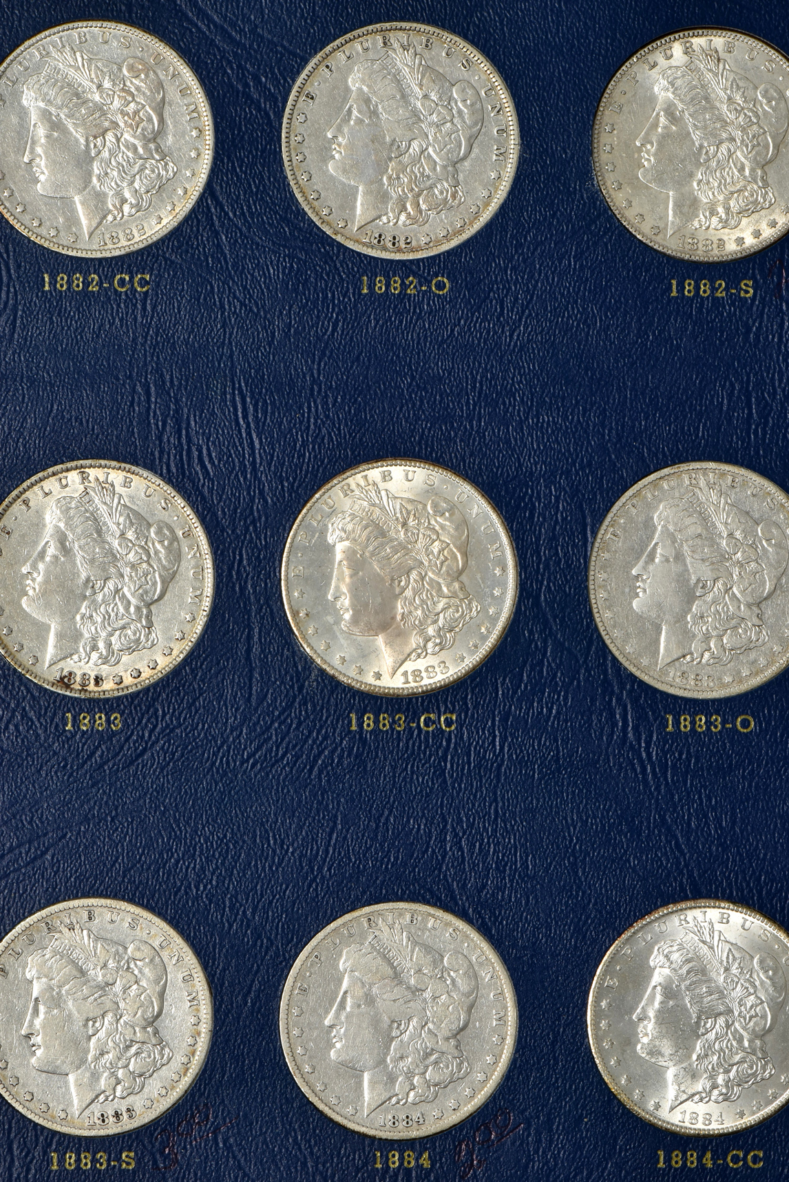 Collection of Morgan silver dollars, 1878 through 1886-S in a complete Whitman 9427 album