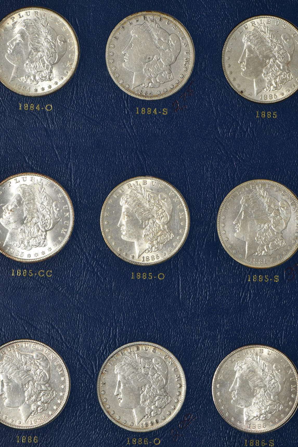 Collection of Morgan silver dollars, 1878 through 1886-S in a complete Whitman 9427 album