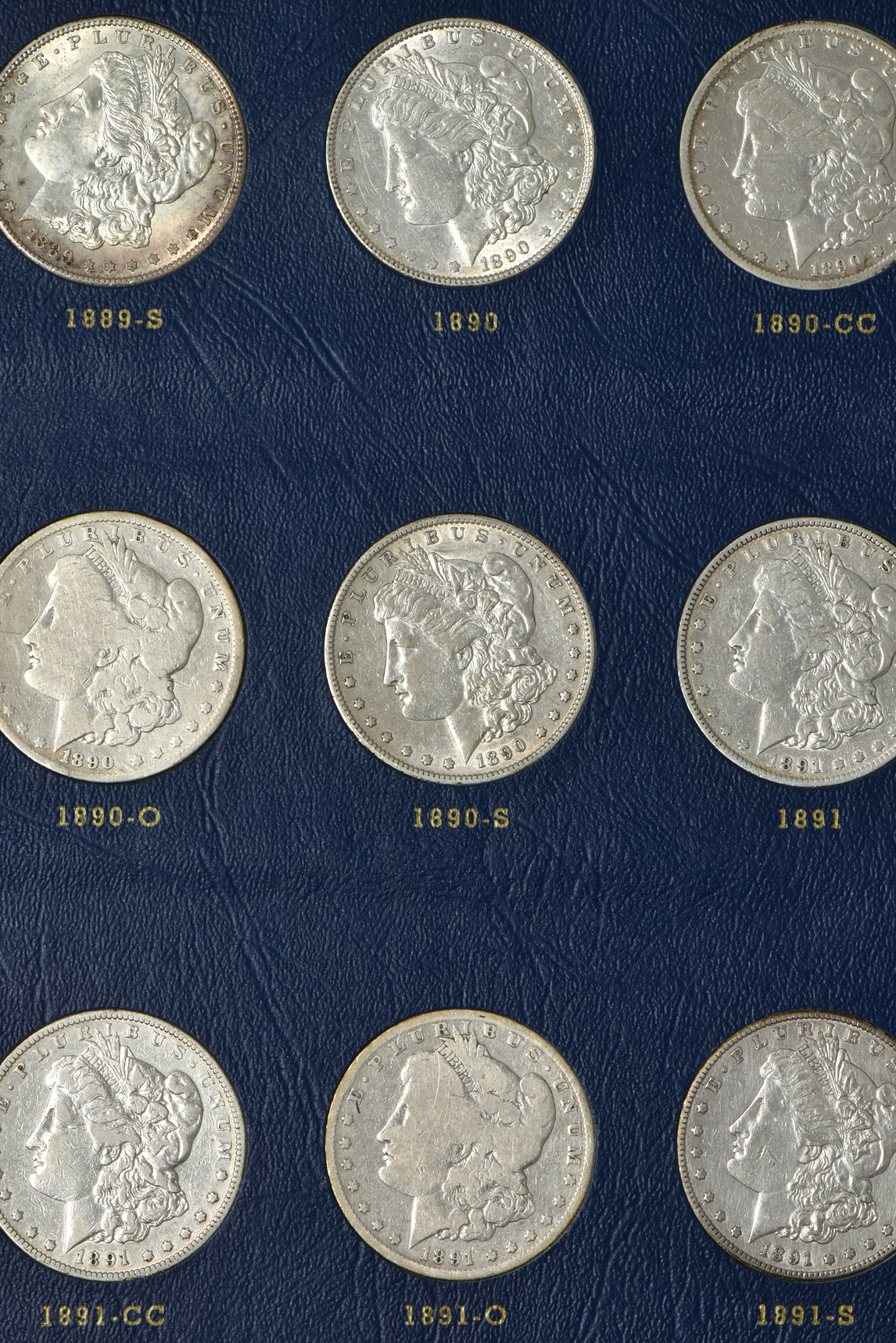 Collection of 34 different Morgan silver dollars, 1887 through 1896-S (no 1895) in a Whitman 9428 album