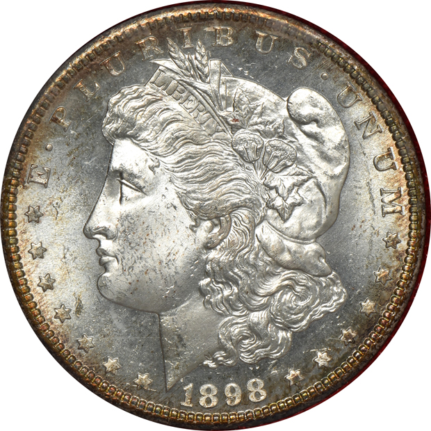 Four Redfield Morgan silver dollars