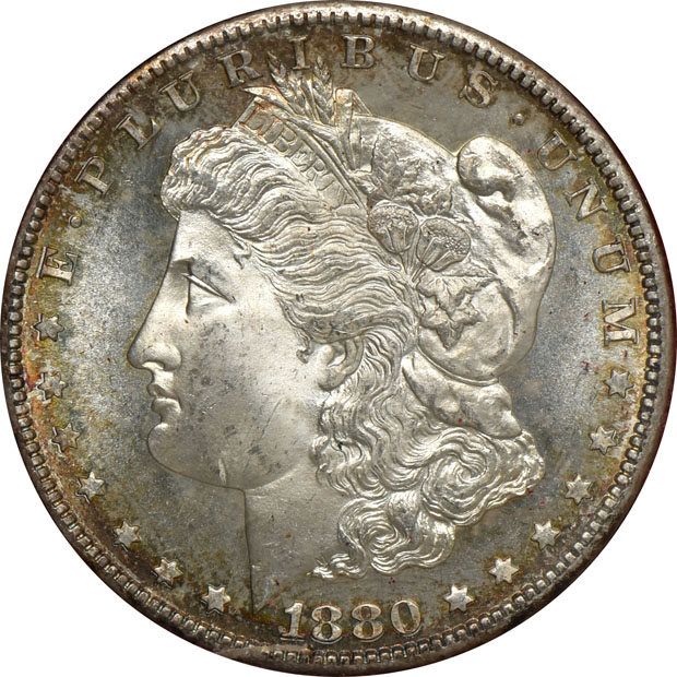 Three Redfield dollars, plus an 1880-S in a Paramount International Coin Corp. holder