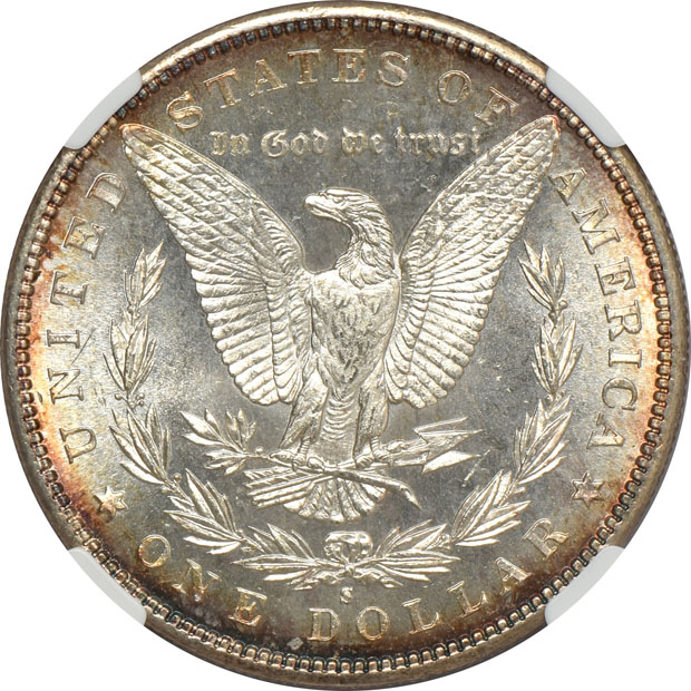 Four Morgan silver dollars.  Two PCGS MS-65, one NGC MS-65+, and one NGC MS-65