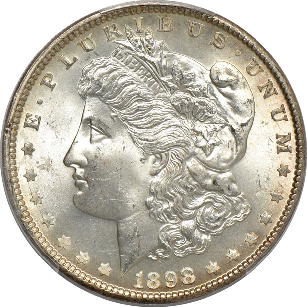 Five certified MS-65 Morgan silver dollars, three NGC and two PCGS