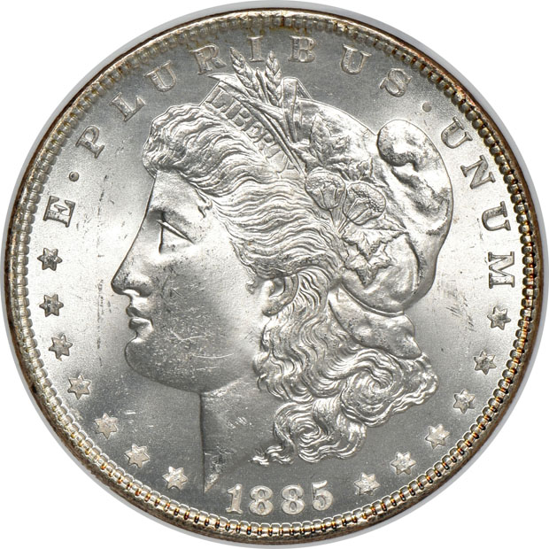 Five certified MS-65 Morgan silver dollars, three NGC and two PCGS