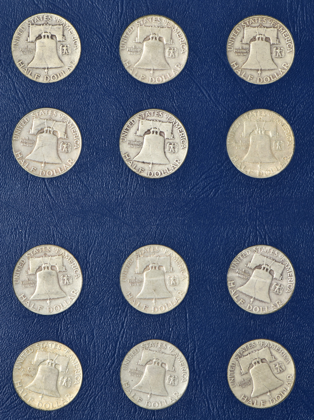Collections of Jefferson nickel, Roosevelt dimes, silver Washington quarters, and Franklin half dollars in four Whitman folders