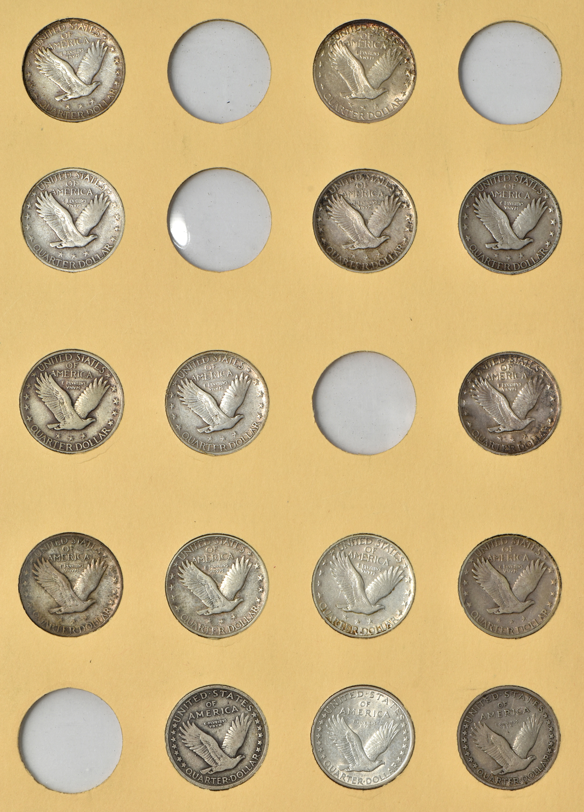 Collection of 33 different Standing Liberty quarters in a Library of Coins album