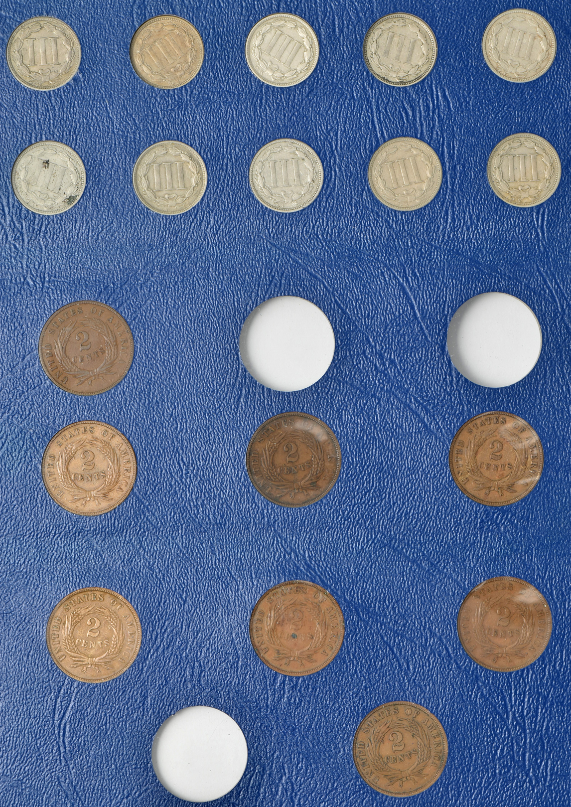 Collection of two-cent and three-cent nickels in a Whitman 9436 album