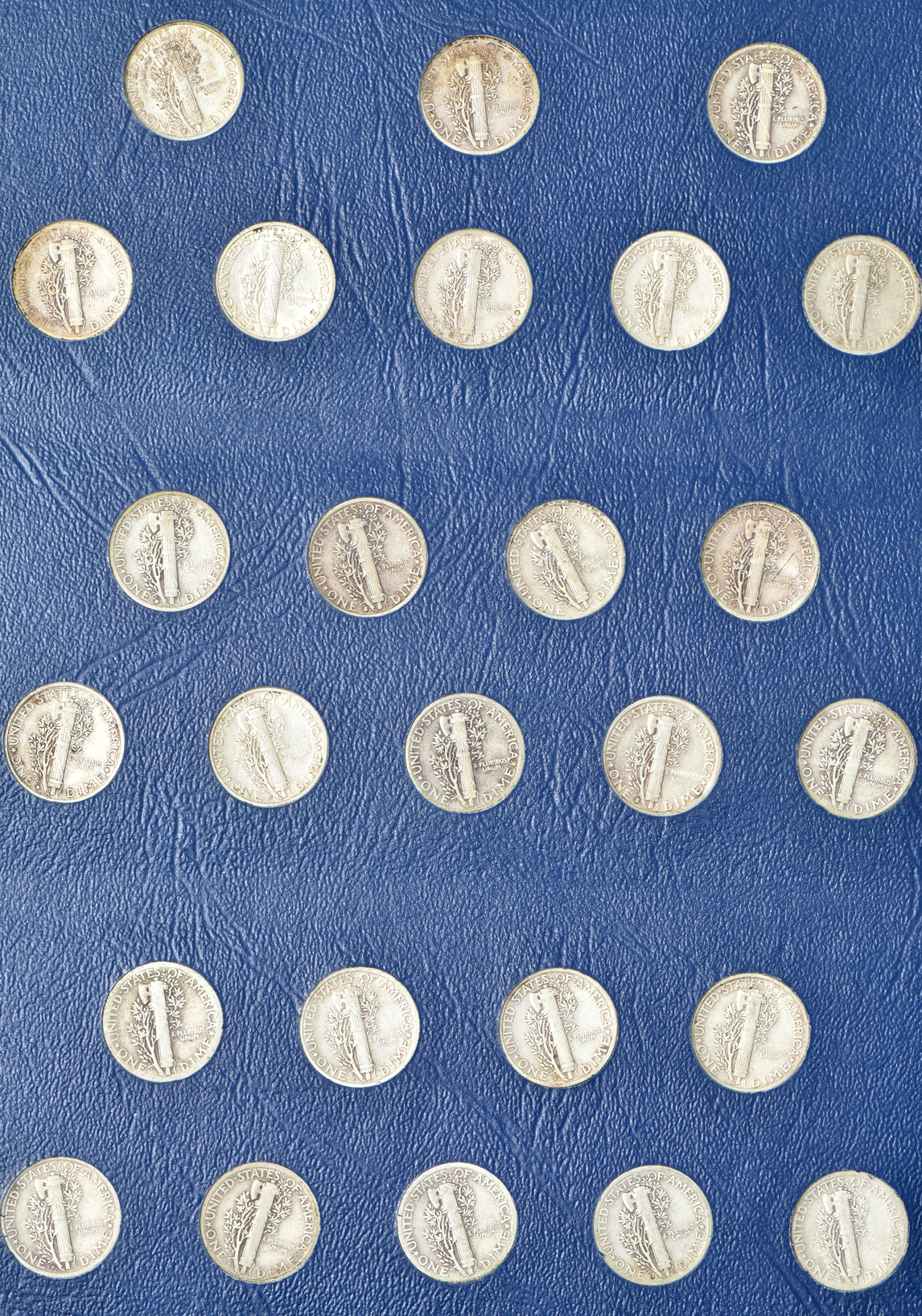 Collection of Mercury dimes in a Whitman 9413 album