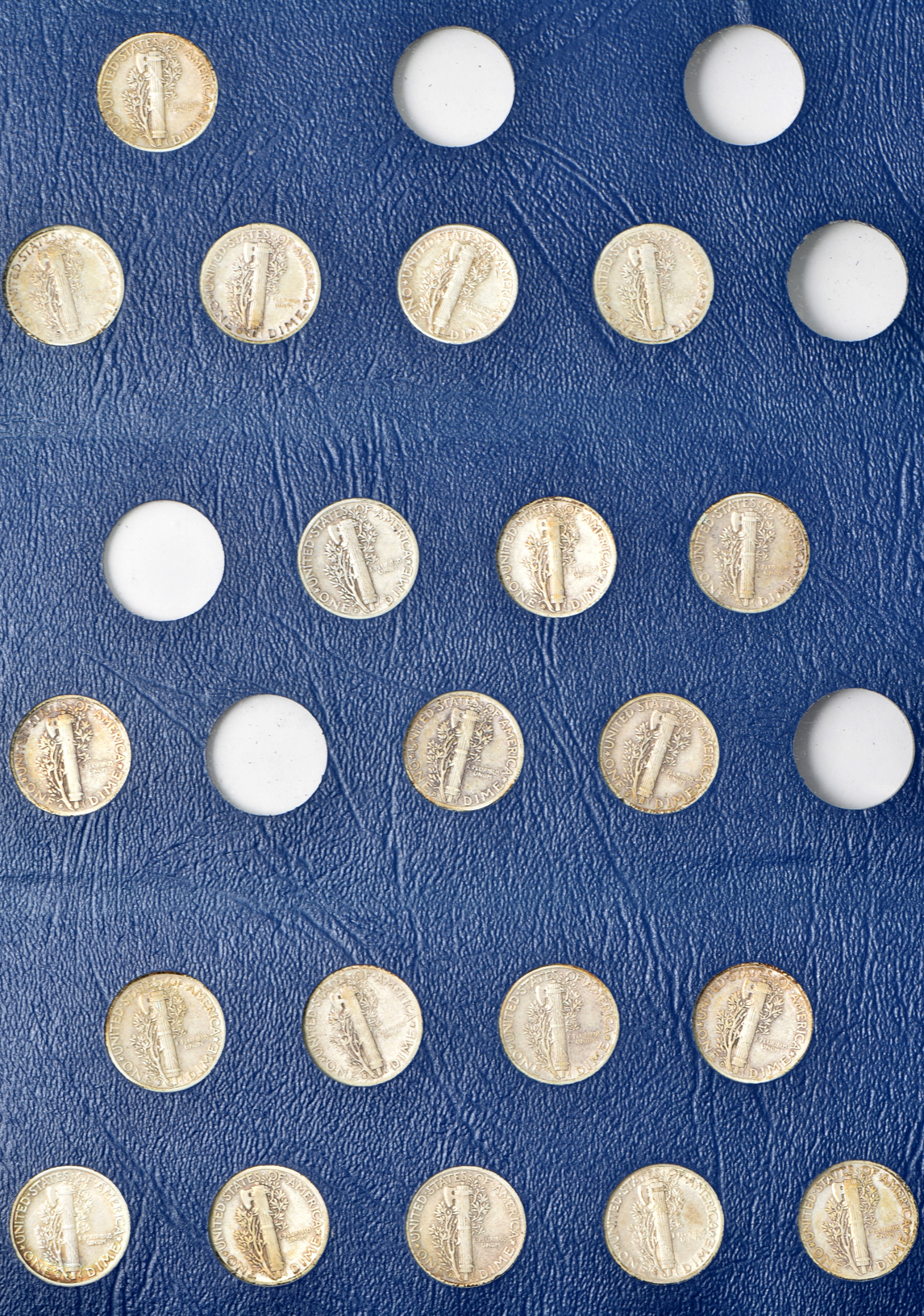 Collection of Mercury dimes in a Whitman 9413 album