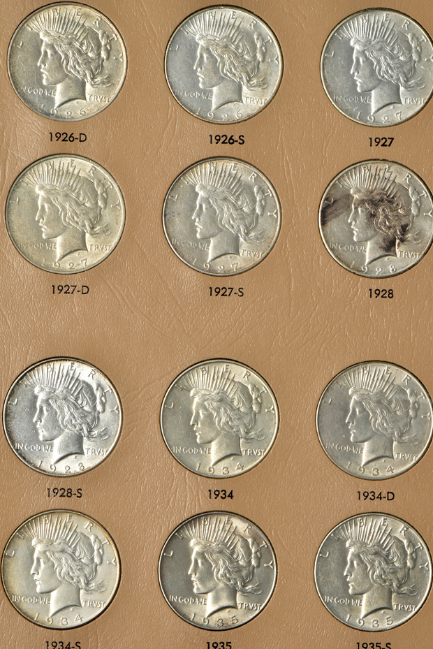 Complete collection of Peace silver dollars in a Dansco 7175 album