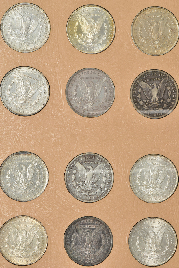 Collection of 45 different Morgan silver dollars in a Dansco 7178 album