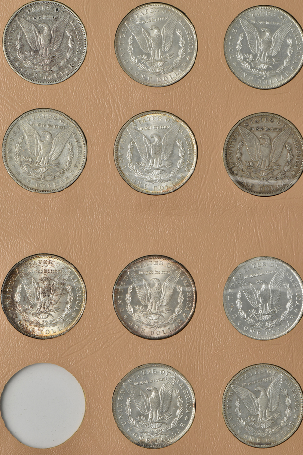 Collection of 45 different Morgan silver dollars in a Dansco 7178 album