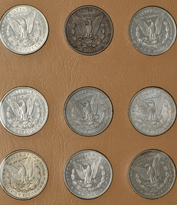 Collection of 44 different Morgan silver dollars in a Dansco album