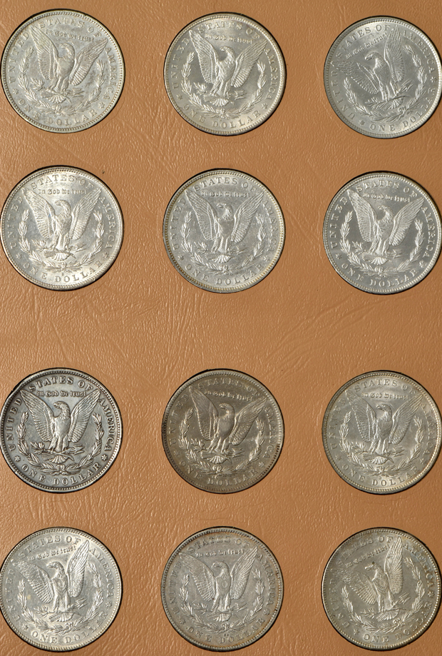 Collection of Morgan silver dollars, 1878-1890-S, in a complete Dansco album