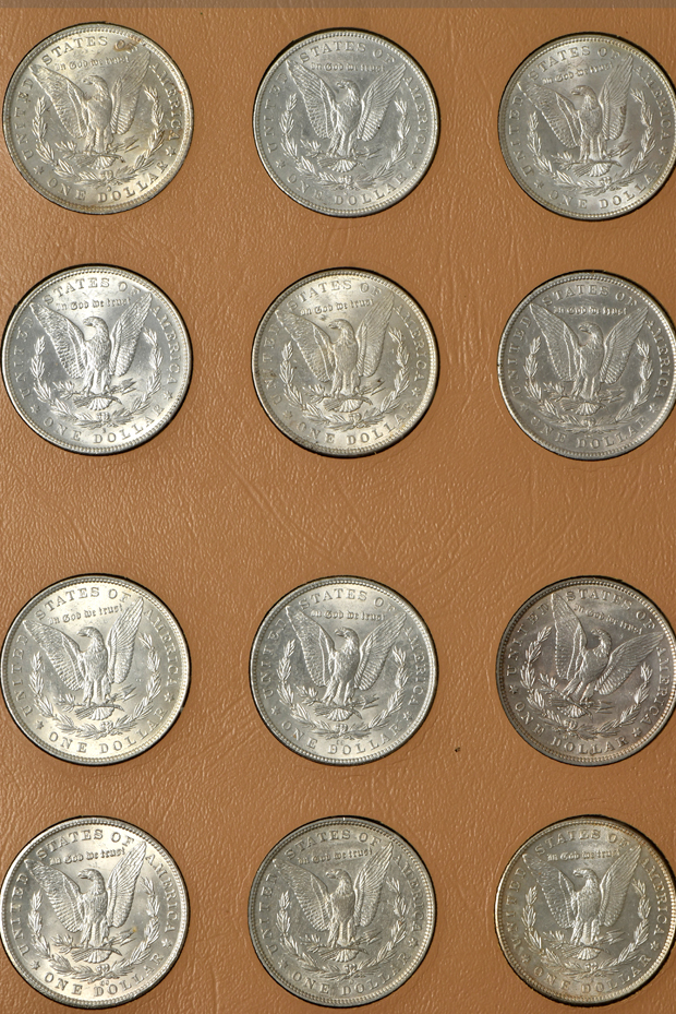 Collection of Morgan silver dollars, 1878-1890-S, in a complete Dansco album
