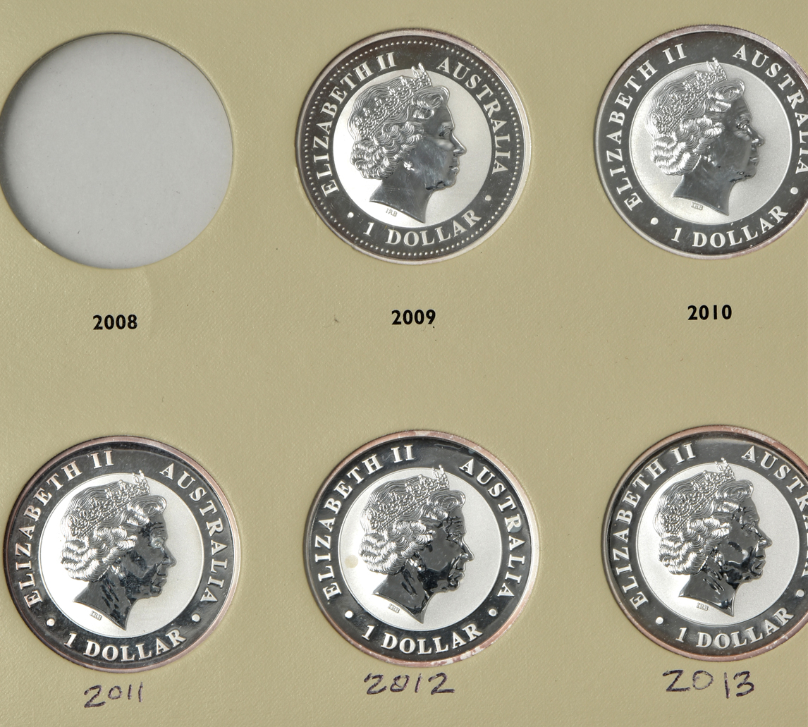 Australia - Group of twenty-three Australian silver Kookaburras in a Littleton Archival album