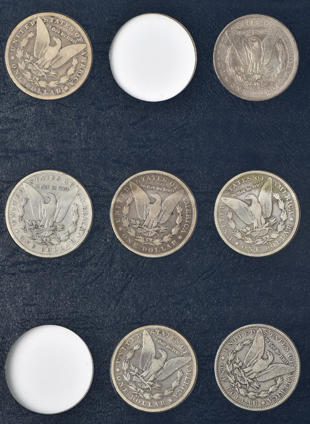 Collection of 41 different Morgan silver dollars in a Whitman 9129 album